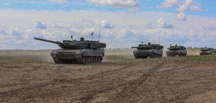 Leopard 2 tanks assigned to the Royal Danish Army advance onto the field during a multinational live-fire exercise at Mielno Range, Poland, May 27, 2022. Defender Europe 22 is a series of U.S. Army Europe and Africa multinational training exercises in Eas