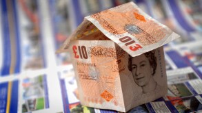 A house made out of ten pound notes to illustrate house prices in the UK. Image shot 2007. Exact date unknown.