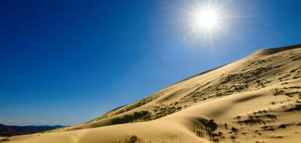Kelso Dunes, also known as the Kelso Dune Field, is the largest field of aeolian sand deposits in the Mojave Desert. The region is protected by the Mo