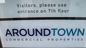 19 November 2019, Germany (German), Berlin: A lettering indicates the branch of the Luxembourg real estate group Aroundtown in the capital. (to dupa "Billion dollar merger: Aroundtown submits offer for TLG") Photo: Paul Zinken/dpa