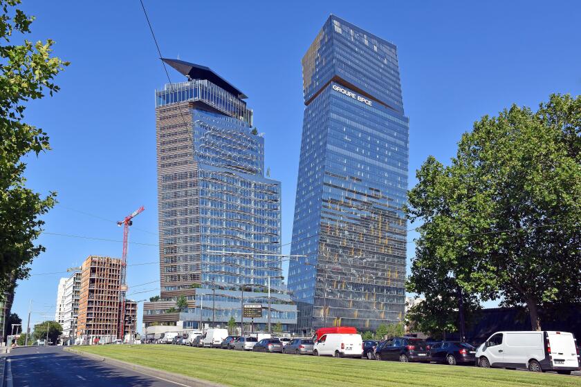 The Tours Duo, twin towers, Paris, a pair of dramatic, leaning skyscrapers, of offices, hotel and shopping, architects Atelier Jean Nouvel,
