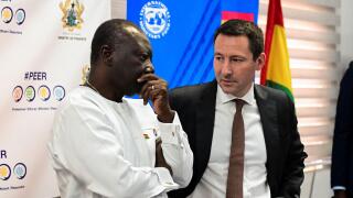 Ken Ofori-Atta, Ghana's finance minister, and IMF Mission Chief Stephane Roudet