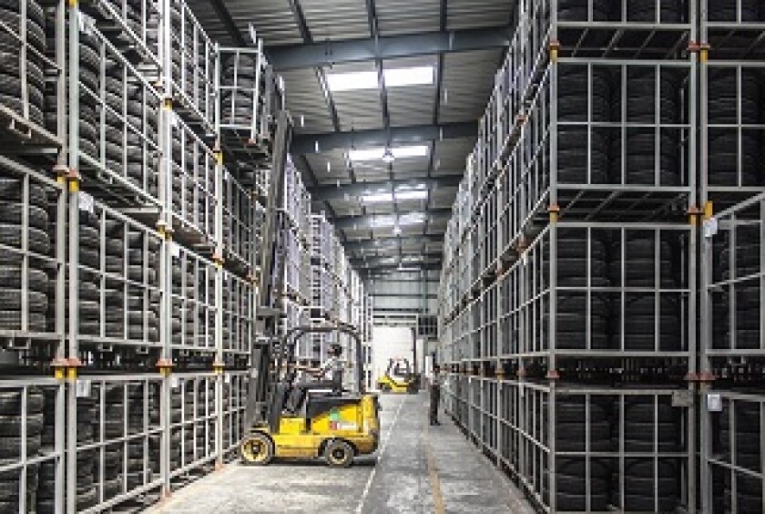 Forklift truck in a warehouse