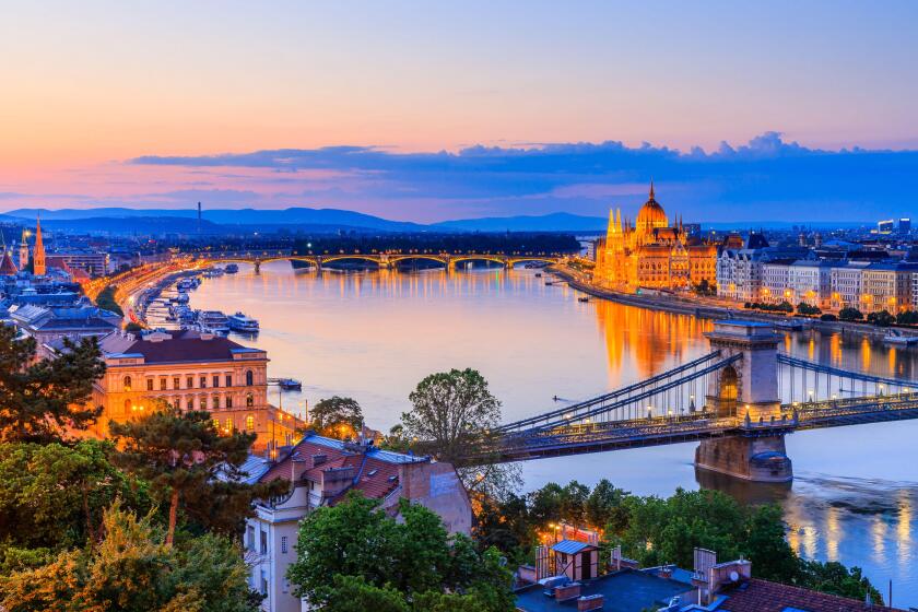 Budapest, Hungary. Panoramic view with the Chain Bridge and the Parliament on the Danube river.