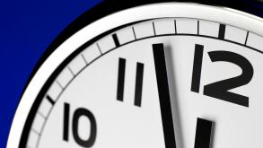 Close up clock face at 12 O'Clock