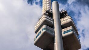 Zizkov Television Tower - ?i?kovska ve? - with "Babies" (Miminka) sculptures by David Cerny; ?i?kov TV Tower in Mahlerovy sady, Prague