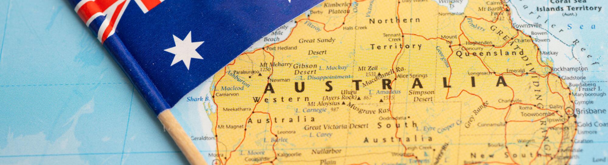 Bangkok, Thailand - February 7, 2021 Australia flag on world map background.