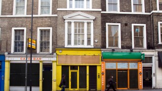Boarded up shops Borough High Street Southwark London. Image shot 03/2009. Exact date unknown.