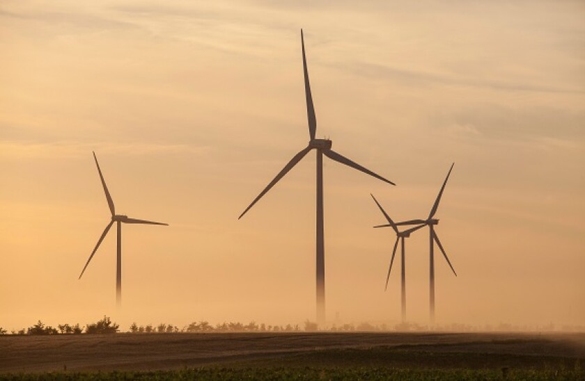 Wind farm at dusk, Ribemont, Picardy, France, August 2013.