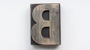 Letterpress letter B printing block isolated on a white background