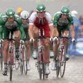 (dpa) - Team Credit Agricole, led by Norwegian cyclist Thor Hushovd (C), rides during the 64.5 km long fourth stage of the Tour de France from Cambrai to Arras, France, 7 July 2004. Heavy rains throughout the stage caused many crashes and defects. The tea