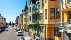 Helsinki colorful houses in Huvilakatu Street, Helsinki Finland. Colourful street with pastel coloured Jugendstil and Art Nouveau town villas