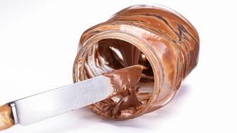 empty jam jar with chocloate spread