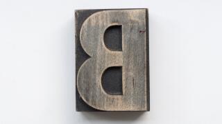 Letterpress letter B printing block isolated on a white background
