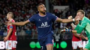 PSG's Kylian Mbappe celebrates after scoring his side's second goal during a French League One soccer match between Brest and PSG at the Francis-Le Ble stadium in Brest, France, Friday, Aug. 20, 2021. (AP Photo/Daniel Cole)