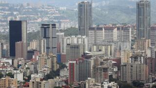 Stunning view of Caracas capital city downtown with main business buildings from majestic El Avila mountain Venezuela