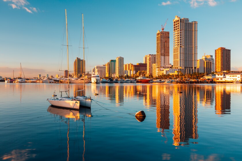 Skyline of Manila City and Manila Bay adobe