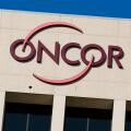 A logo sign outside of a facility occupied by Oncor Electric Delivery in Dallas, Texas on September 13, 2015.
