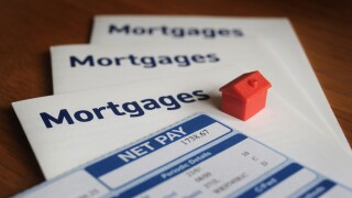 MODEL HOUSE WITH MORTGAGE LEAFLETS AND NET PAYSLIP RE HOME BUYERS BUYING FIRST TIME BUYERS PROPERTY MARKET HOUSING INCOMES UK