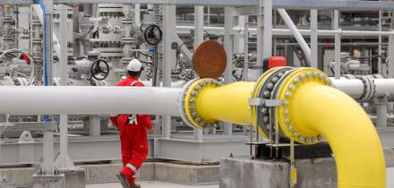 Vadu, Romania - June 28, 2022: Engineer works at a gas treatment plant.
