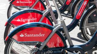 Santander sponsorship on a row of  'Boris Bikes' for hire in London.