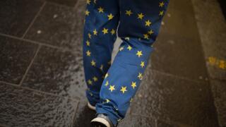 Glasgow, Scotland, Tuesday, 18th December 2018. A campaigner swearing a pair of EU flag trousers, outside the Bollocks to Brexit bus, campaigning for a People's Vote and a 2nd referendum on the Brext deal, in Glasgow, , Scotland, 18 December 2018. ?BOLLOC