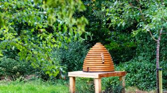 Wooden model bee hive in the grounds of Marble Hill House, Twickenham, London