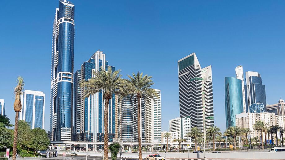 Tall skyscrapers against the blue sky. Dubai. UAE