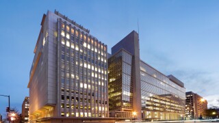The World Bank Building headquarters main building at dusk. H Building 1818 H Street; Pennsylvania Avenue, Washington DC, USA