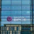 Sign on the facade of a building belonging to the French banking group BPCE, resulting from the merger of Banque Populaire and Caisse d'Epargne