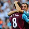 West Ham United's Mark Noble (right) celebrates with team mate Scott Parker, after his effort deflects off Blackburn Rovers' Christopher Samba to give West Ham United their second goal of the game.