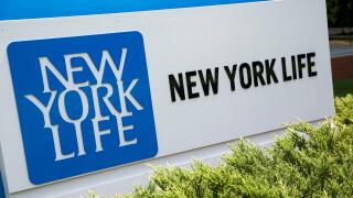 A logo sign outside of a facility occupied by the New York Life Insurance Company in Glen Allen, Virginia on July 19, 2015.