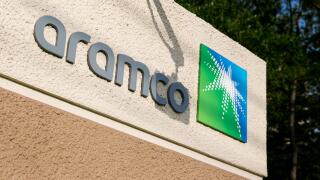 A logo sign outside of a facility occupied by Saudi Aramco in Houston, Texas, on May 27, 2017.