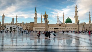 Muslims gathered for worship Nabawi Mosque, Medina, Saudi Arabia