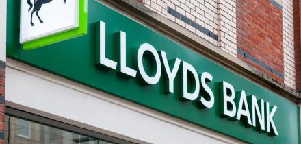 Lloyds Bank Black Horse sign and name over a branch of the bank in UK.