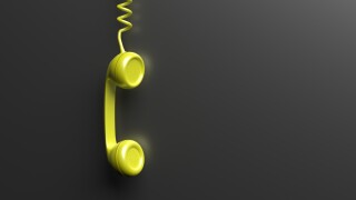 Old phone receiver on black background. 3d illustration