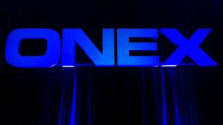 Onex Corp. is reporting an earnings loss in its second quarter after its investments slipped in value. The Onex Corporation logo is displayed at the company's annual general meeting in Toronto on Thursday, May 10, 2012. THE CANADIAN PRESS/Nathan Denette