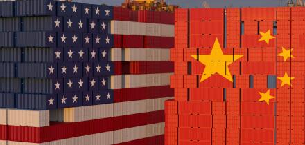 Stacks of Containers in the seaport stacked in the shape of the US flag and opposite in the shape of the flag of China