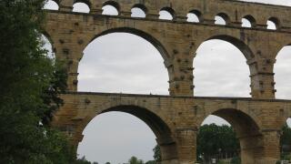 Three tiers of arches form the Pont du Gard, the Roman aqueduct over the Gardon River and now a UNESCO World Heritage Site.
