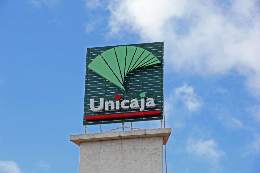 Sign over Unicaja bank, Torremolinos, Spain