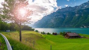 Beautiful lake in Switzerland. Sunny morning at the Swiss countryside.