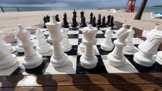 Giant outdoor chess set on Harvest Caye - private island owned by Norwegian Cruise Line in Belize