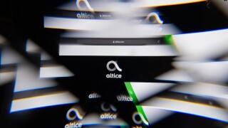 Milan, Italy - APRIL 10, 2021: Altice logo on laptop screen seen through an optical prism. Dynamic and unique image from Altice website. Illustrative editorial.