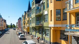Helsinki colorful houses in Huvilakatu Street, Helsinki Finland. Colourful street with pastel coloured Jugendstil and Art Nouveau town villas