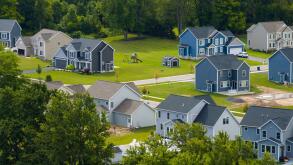 Residential homes in suburban sprawl development in Rochester, New York. Low-density two story private houses in rural suburbs. Housing market in the