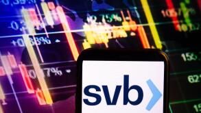 KONSKIE, POLAND - September 10, 2022: Smartphone displaying logo of SVB Financial Group company on stock exchange diagram background