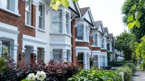 Street of typical terraced houses - London UK