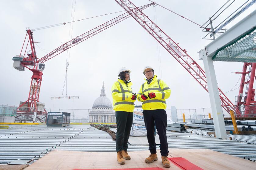 Labour leader Sir Keir Starmer and shadow chancellor Rachel Reeves meet construction workers and apprentices during their visit to Panorama St Paul?s in the City of London which is to be the new headquarters of the HSBC offices. They outlined Labour's pla