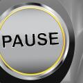 Button Pause on silver background