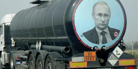 A large tank truck (Serbian licence plate) with image of Vladimir Putin on its rear, drives along the high way through Croatia.